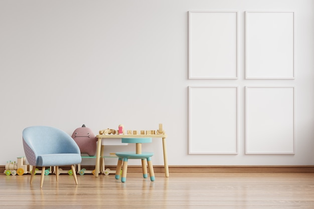 Fauteuil bleu dans l'intérieur de chambre enfant scandinave avec des affiches sur le mur.