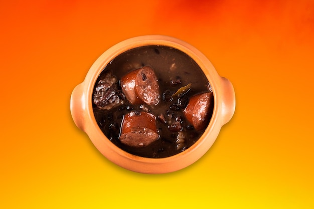 Feijoada en pot en céramique avec fond de couleur dégradé