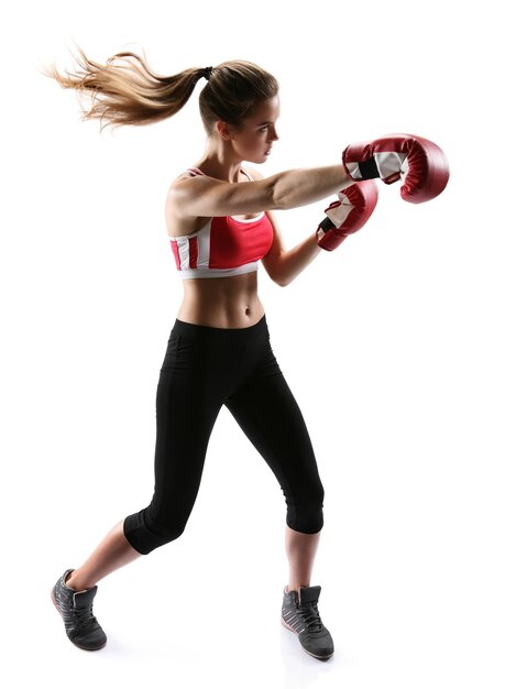 une femme caucasienne faisant de l'exercice pilates fitness bande élastique résistante exercices silhouette isolée