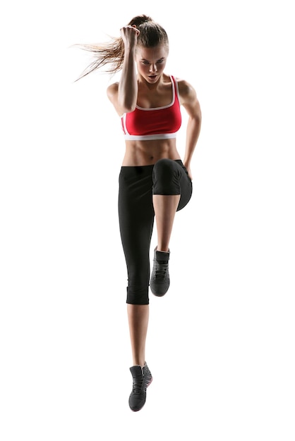 une femme caucasienne faisant de l'exercice pilates fitness bande élastique résistante exercices silhouette isolée