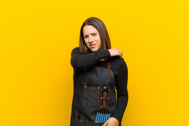 Femme coiffeur, fatigué