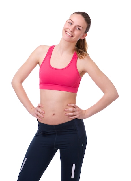 Femme dans les vêtements de gym souriant