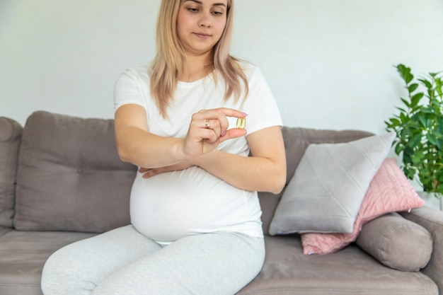 Femme enceinte boit des oméga trois Mise au point sélective