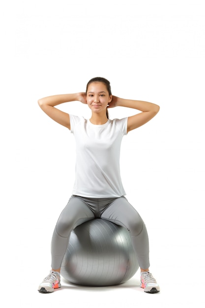 Femme fitness et pilates ball