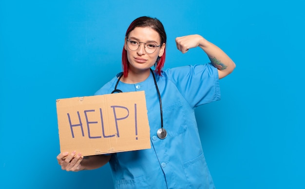 Femme infirmière cool cheveux roux. concept de crise médicale