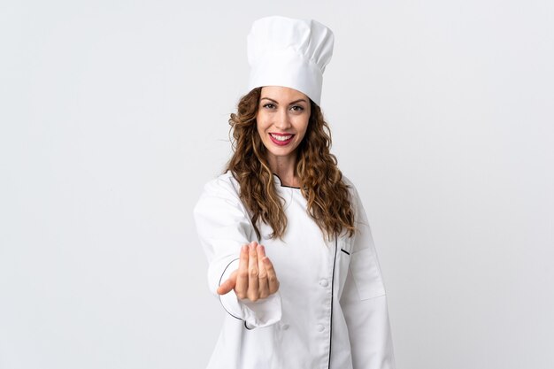 Femme Jeune Chef Isolé Sur Un Mur Blanc Invitant à Venir Avec La Main.