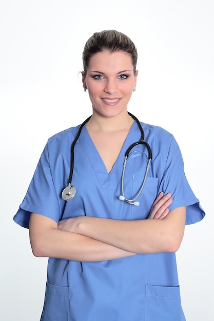 Femme médecin en uniforme bleu avec stéthoscope