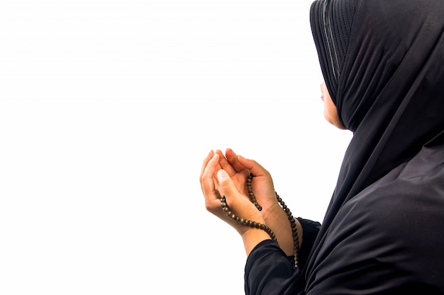 Femme musulmane priant pour Allah, Dieu musulman