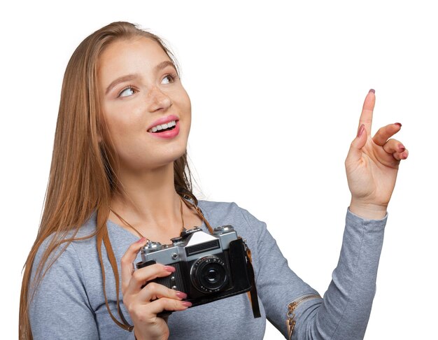 Femme photographe avec caméra