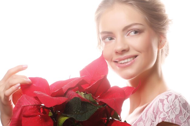 femme, à, rouges, noël, fleurs