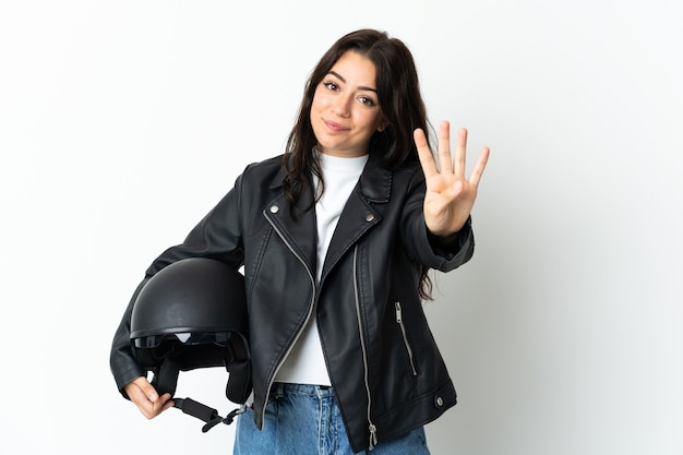Femme tenant un casque de moto isolé