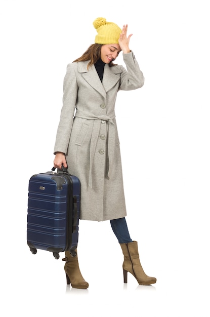 Femme avec valise prête pour les vacances d&#39;hiver