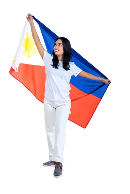 Les femmes asiatiques célèbrent le jour de l'indépendance des Philippines le 12 juin en tenant le drapeau des Philippines