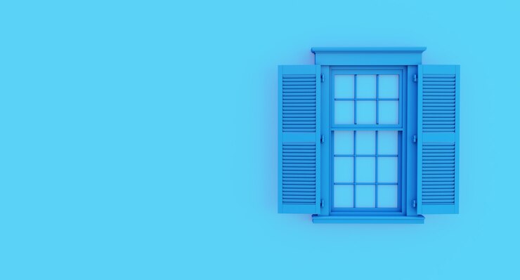 Photo fenêtre ouverte bleue colorée isolée sur fond bleu.