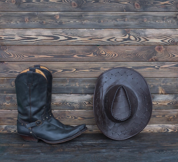 Ferme de hangar de chapeau de bottes de cowboy