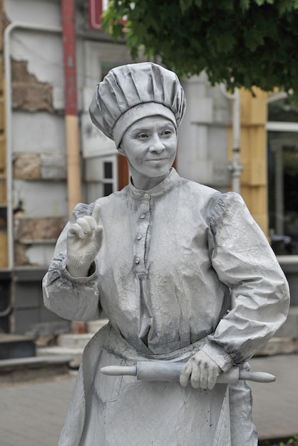 Festival des statues vivantes acteur imitant une statue de boulanger Statue vivante