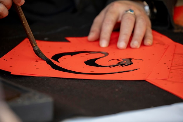 Photo fête du printemps chinois caractères de pinceau de calligraphie fête du printemps chinois