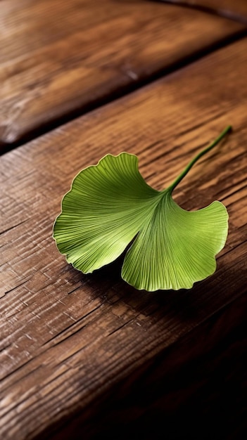 Feuille arafée sur une table en bois avec une tige verte ai générative