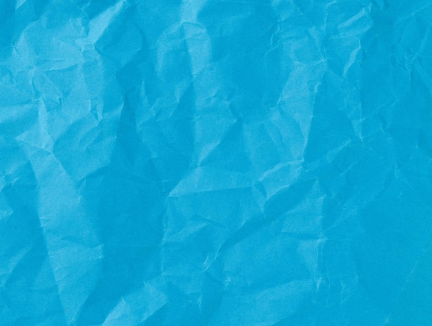 Feuille froissée de papier bleu Toile de fond texturée