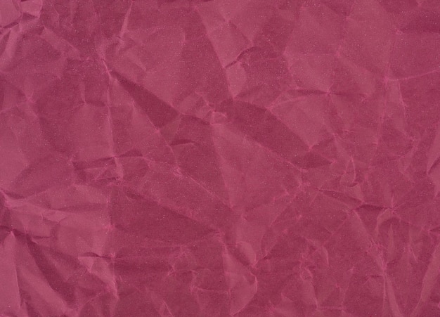 Feuille froissée de papier rouge vin Toile de fond texturée