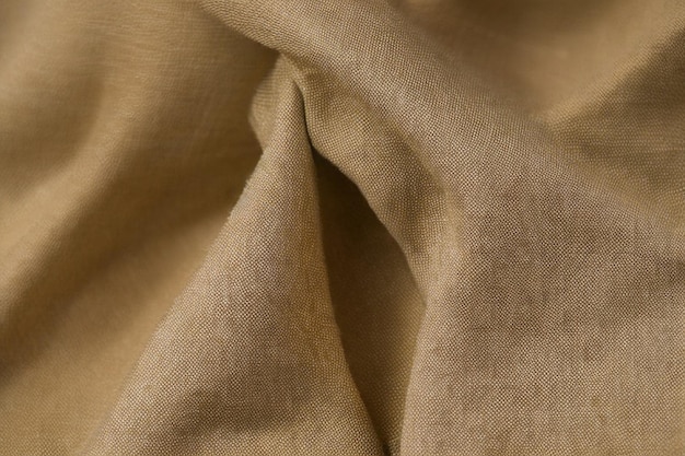 Photo une feuille de tissu dorée