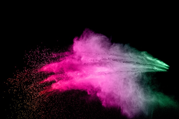 Figer le mouvement des particules de poussière de couleur éclaboussures. Holi peint en festival.