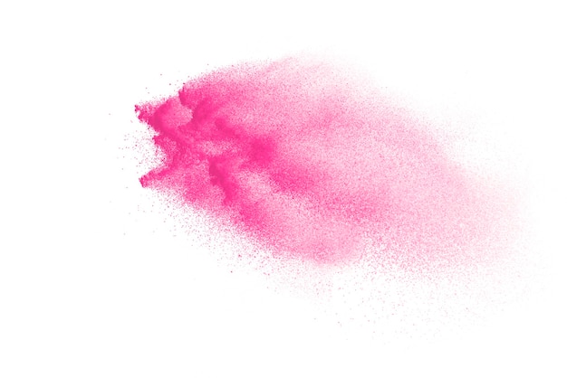 Photo figer le mouvement de poudre de couleur rose qui explose sur blanc