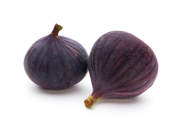 Figues de fruits isolés sur blanc