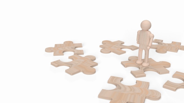 Une figure humaine en bois sur puzzle pour le rendu 3d de fond.