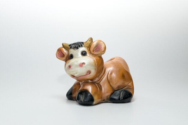 figure en plâtre d'une vache