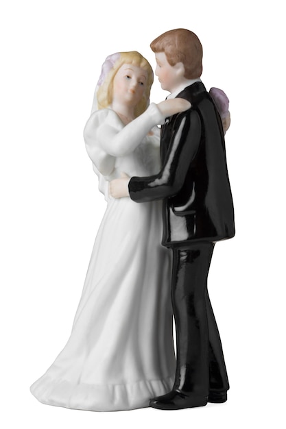 Photo figurine de gâteau de mariage sur blanc