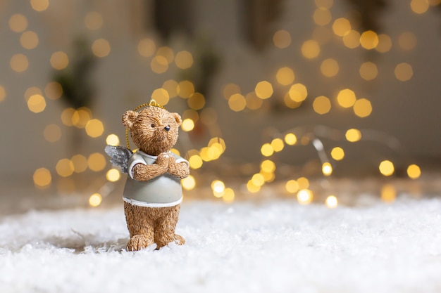 Figurines décoratives d'un thème de Noël, figurine d'un ours mignon avec des ailes d'ange,