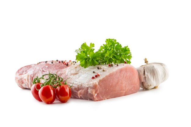 Filet de longe de porc persil tomates aux herbes ail sel et épices est