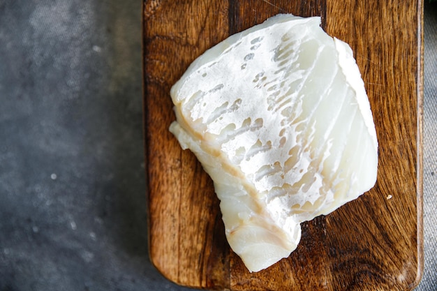 filet de poisson blanc de morue repas sain frais snack régime alimentaire sur la table copie espace arrière-plan alimentaire