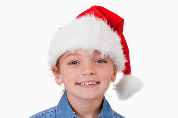 Fille avec un chapeau de Noël