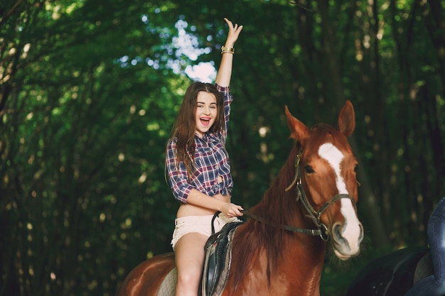 Photo fille à cheval