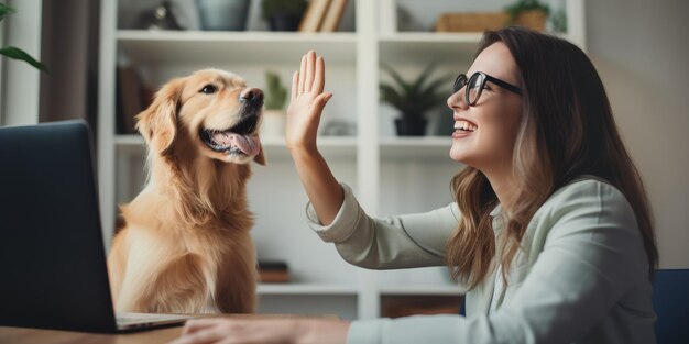 Une fille donne un high-five à son animal de compagnie Entraînant votre chien bien-aimé à la maison à la table AI générative