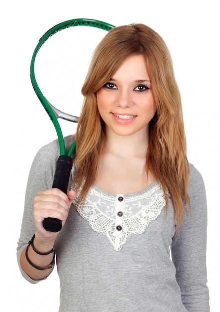 Fille avec une raquette de tennis isolée sur un fond blanc