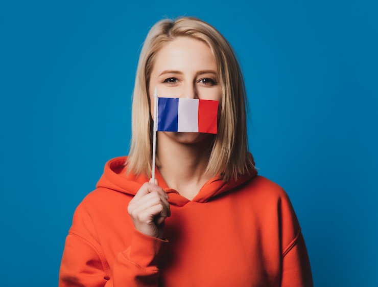 Photo fille tient le drapeau de la france