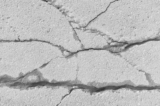 fissure sur le sol fond blanc / abstrait fond blanc vintage texture cassée