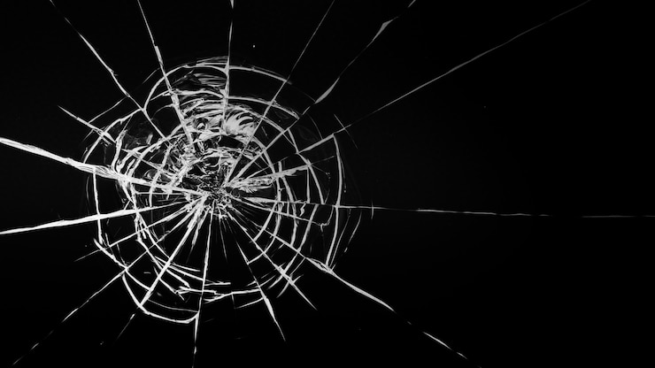 Photo fissures blanches rondes en verre