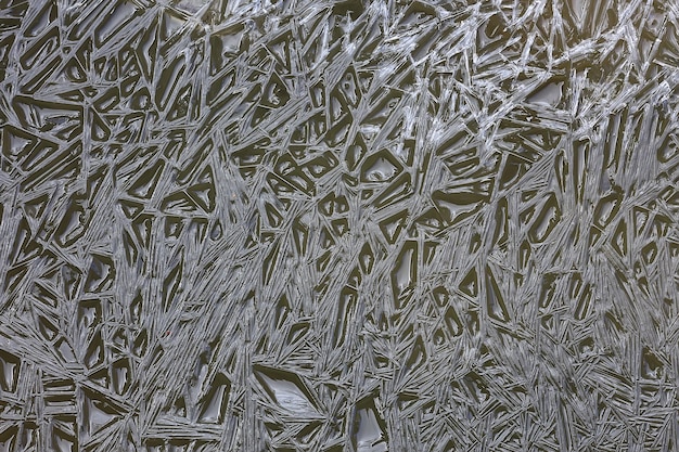 fissures de glace de texture, cristaux de glace blancs, fond de givre d'hiver