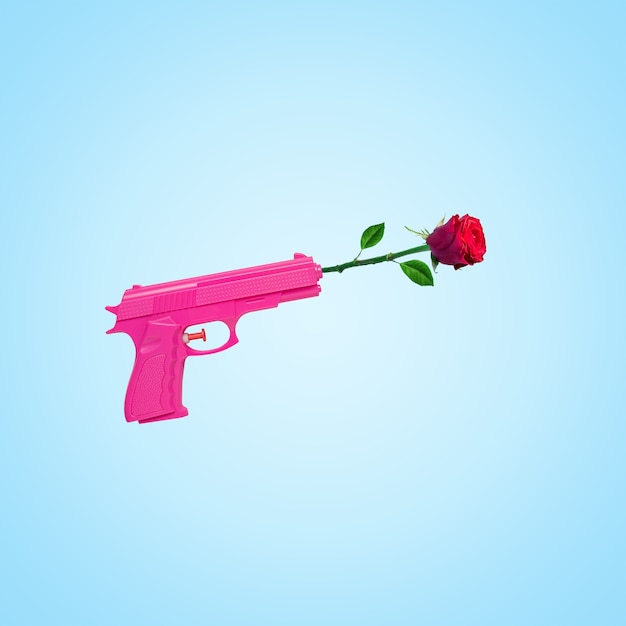 Fleur rose avec arme de poing rose sur fond bleu