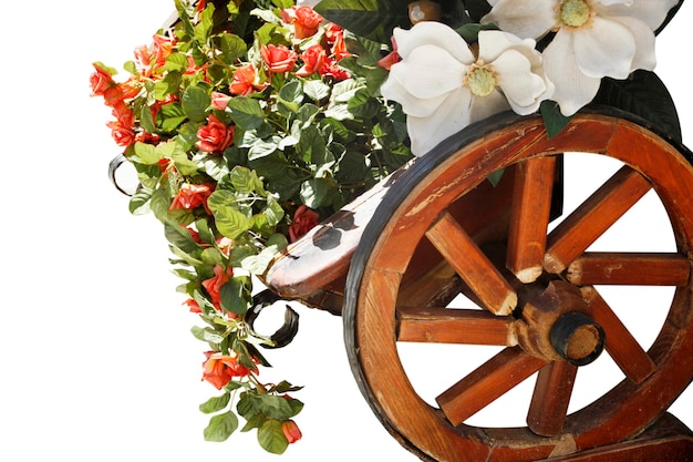 Fleurs sur le vieux chariot en bois