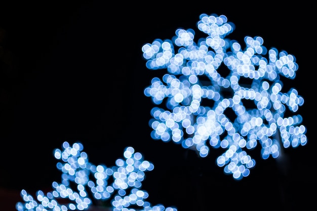 Flocons de neige lumière fond bokeh