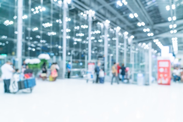 Flou abstrait et intérieur du terminal de l'aéroport défocalisé