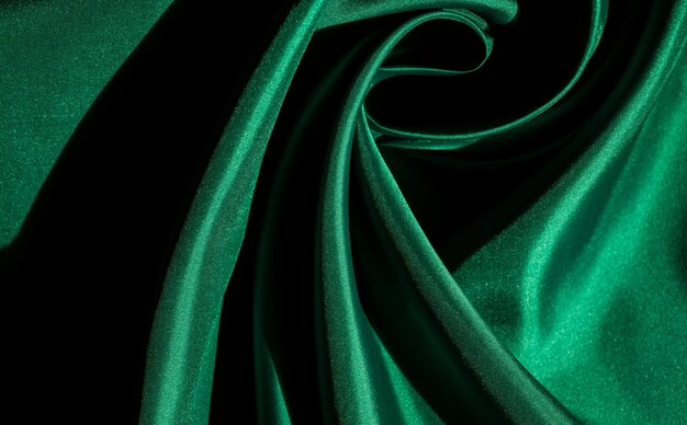 Flou artistique de fond de texture de tissu vert abstrait texture gros plan de tissu