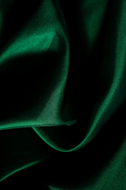 Flou artistique de fond de texture de tissu vert abstrait texture gros plan de tissu