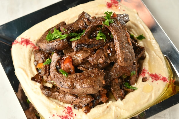 foie de bœuf, servi sec ou au curry en bol, karahi ou assiette