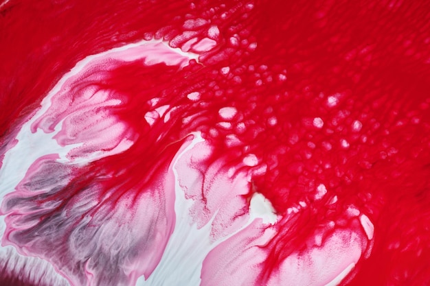 Fond abstrait créatif multicolore Encre d'alcool rouge rose Vagues taches taches et traits de texture de marbre de peinture